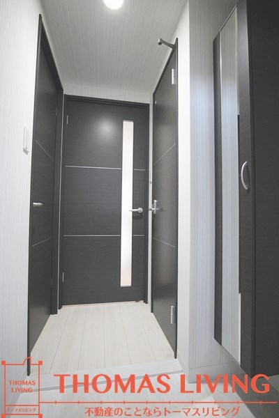 ネクステージ三萩野 玄関