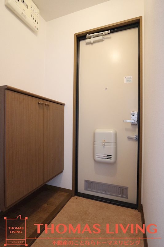 クレセント鴨生田 玄関