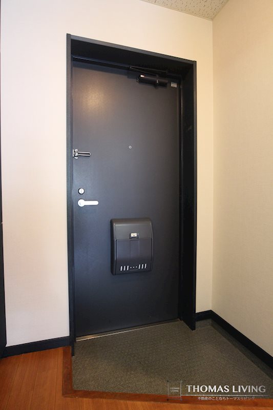 ニューサンリバー８番館 玄関