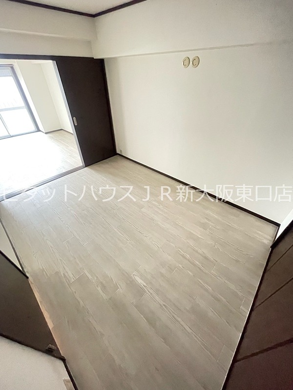 サンフラッツ新大阪本館 ベッドルーム
