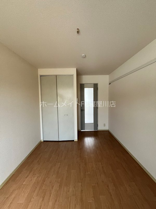 寝屋川菊池ハイツ ベッドルーム