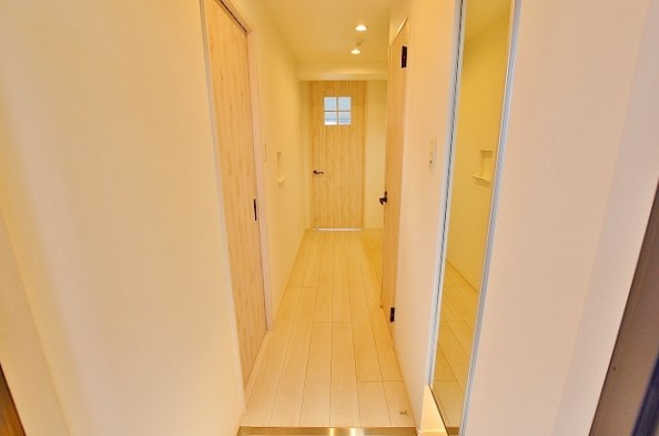 アクシオ三萩野 玄関