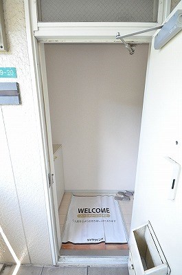 グランディール志井 玄関