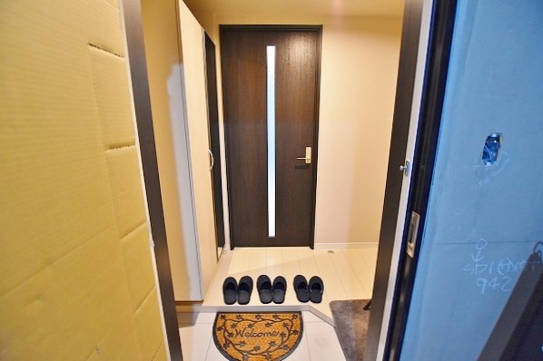 サンシャインタワー三萩野 玄関