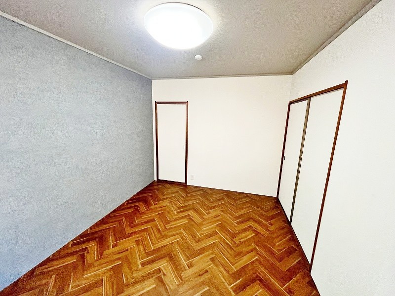 プレジールイトー ベッドルーム