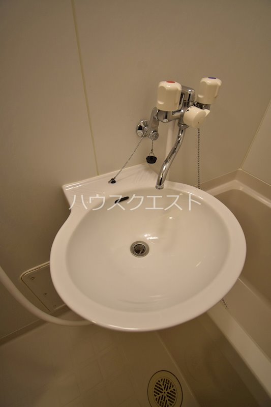 プレジール春日 洗面所