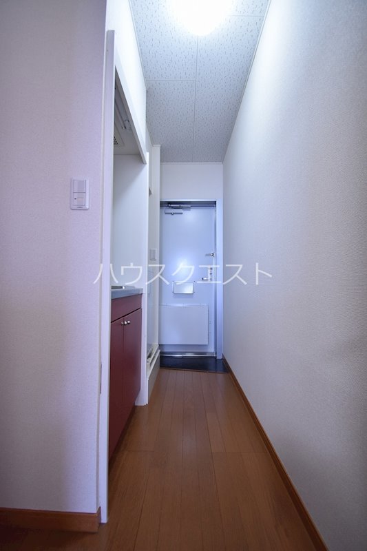 プレジール春日 玄関
