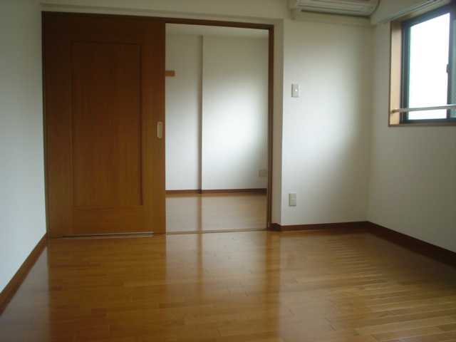 第二下堤谷口マンション ベッドルーム