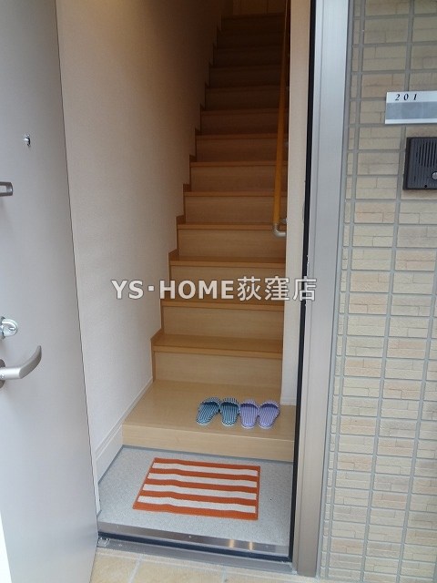 グレイス八千代 玄関