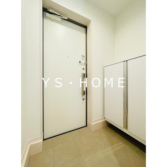 プラムガーデン関根 玄関