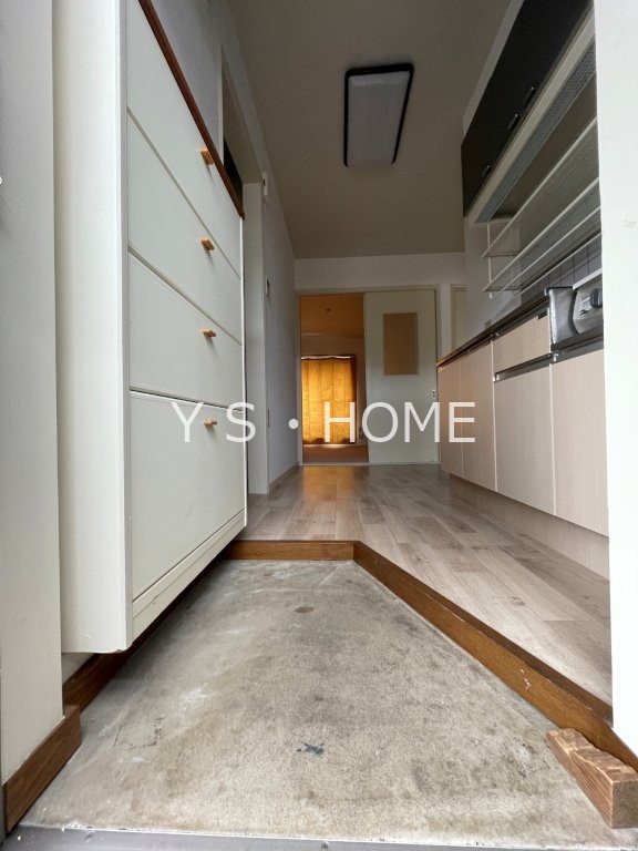 ベルヴィラージュ 玄関