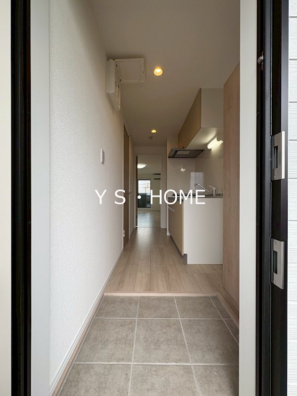 エクセラン柴崎町 玄関