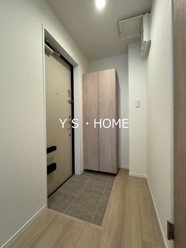 エクセラン柴崎町 玄関