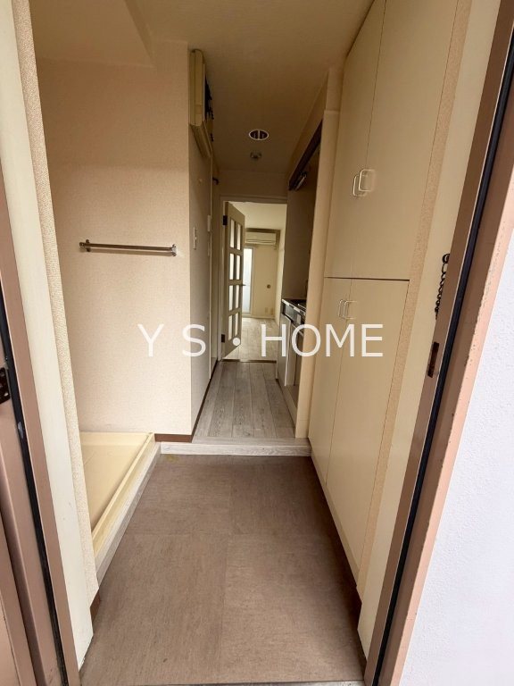 パインコート立川 玄関