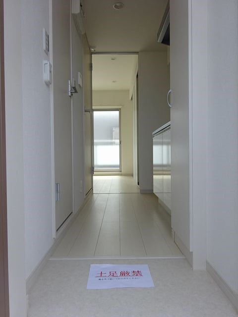 リブリ・テラ　たかの台 玄関