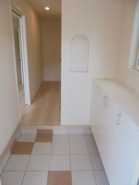 チサカＸI 玄関