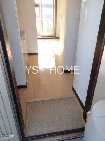 エスティーフォー小金井 玄関