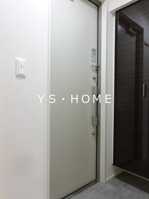 クレールムサシ 玄関