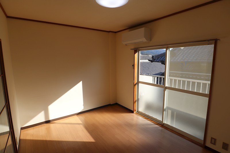 東川サンコーポ ベッドルーム