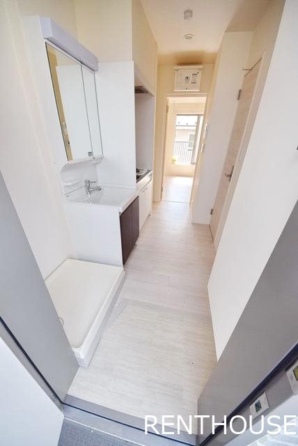 プレジール飛田給 玄関