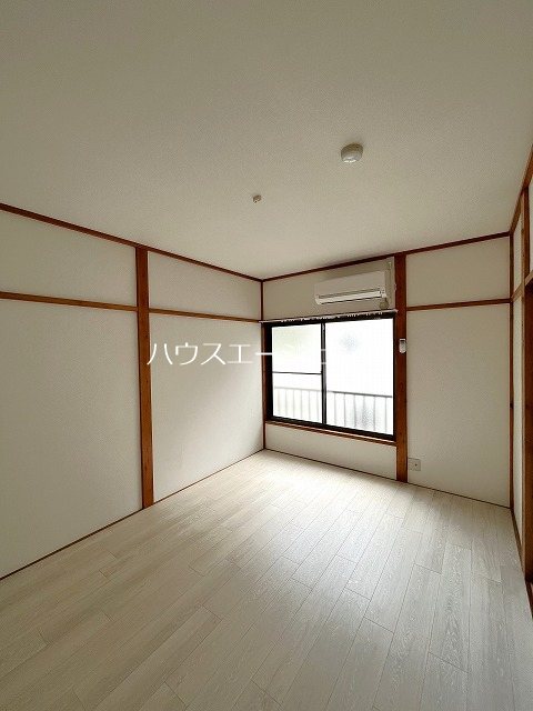 丸清コーポ ベッドルーム