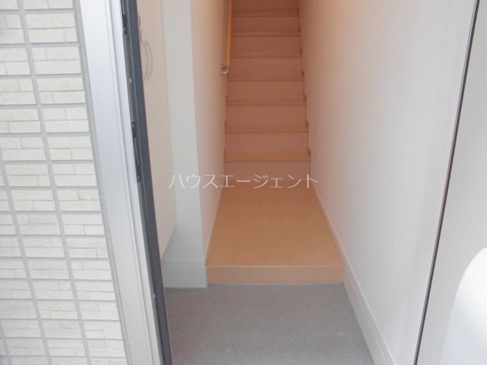 アルシオネT 玄関
