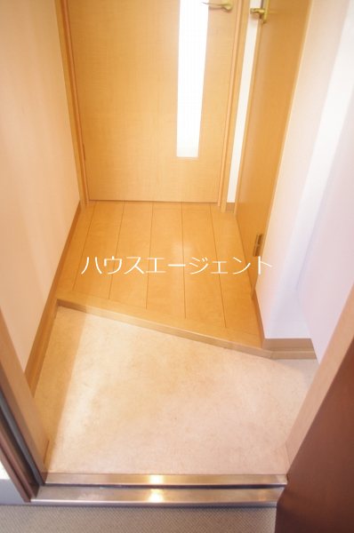 シャルマン新清 玄関