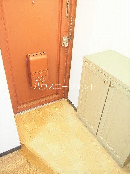 レジデンスタナカ 玄関