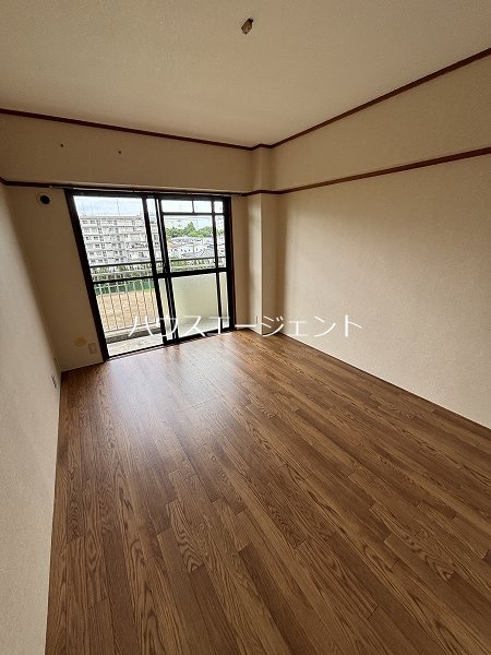 マンションカネイ ベッドルーム