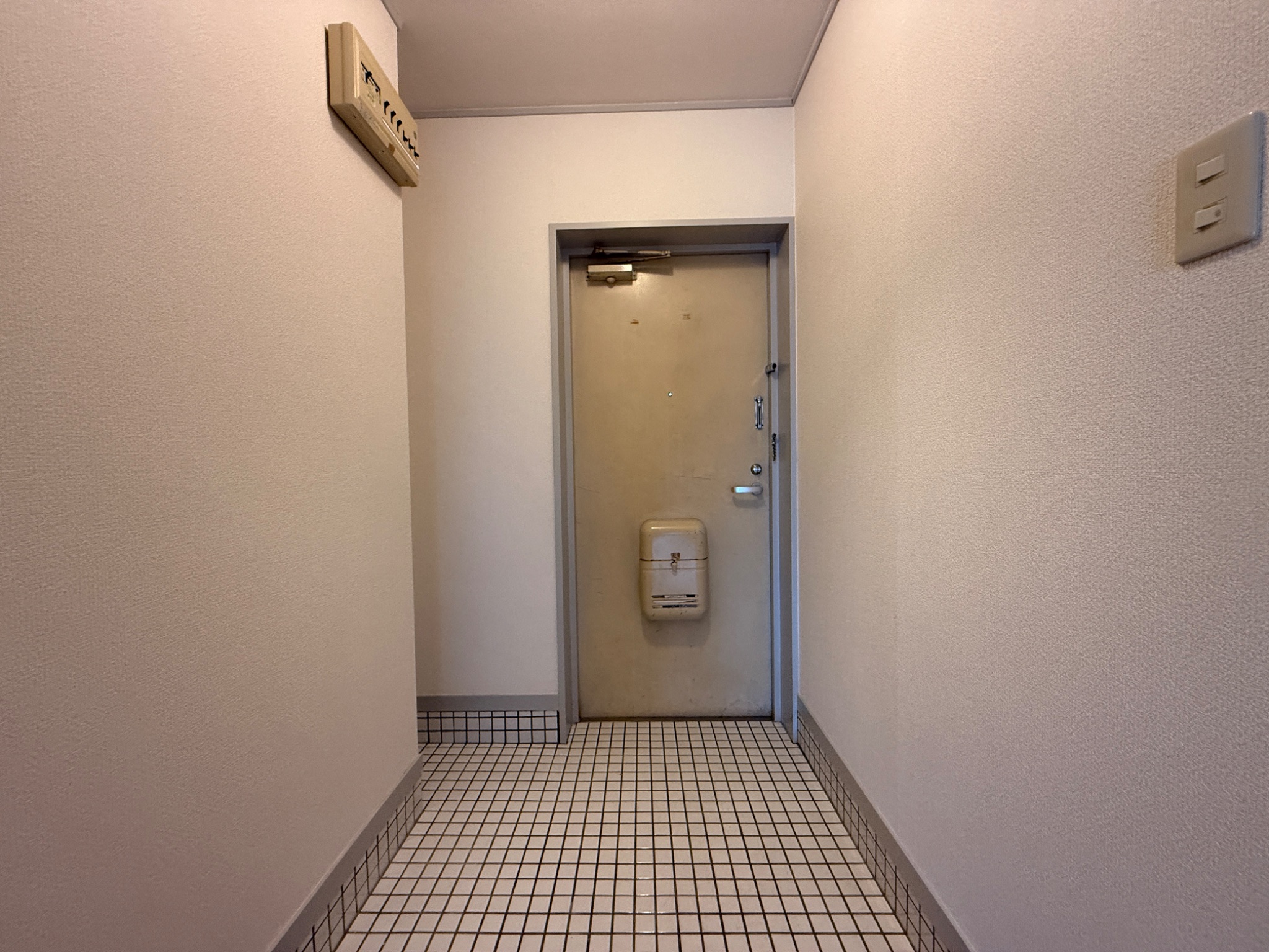 プレジオ王塚台 玄関