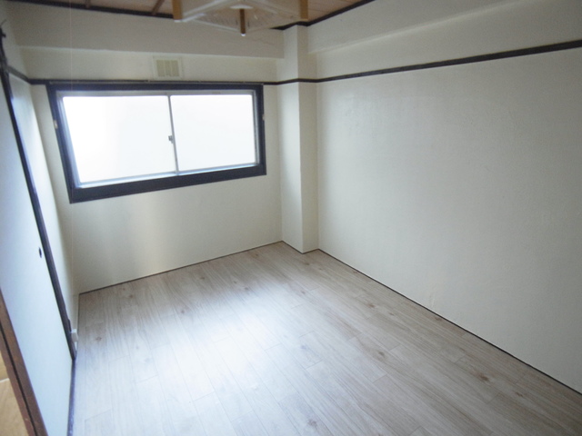 丸吉マンション ベッドルーム