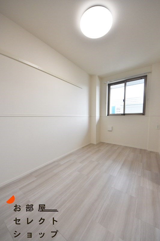 RIKI RESIDENCE ベッドルーム