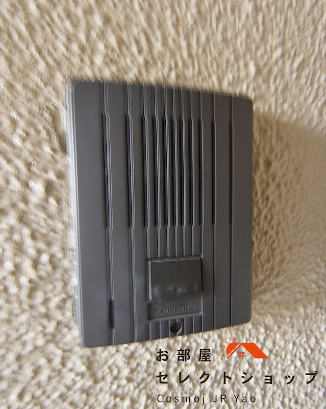 コープ野村恩智B棟  玄関