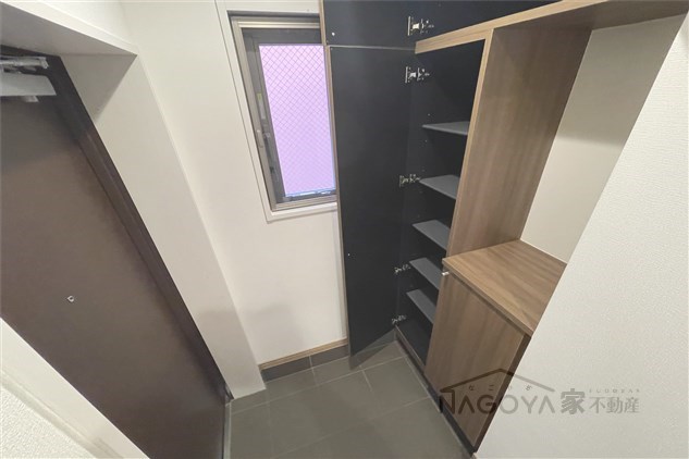 メゾン周令 玄関