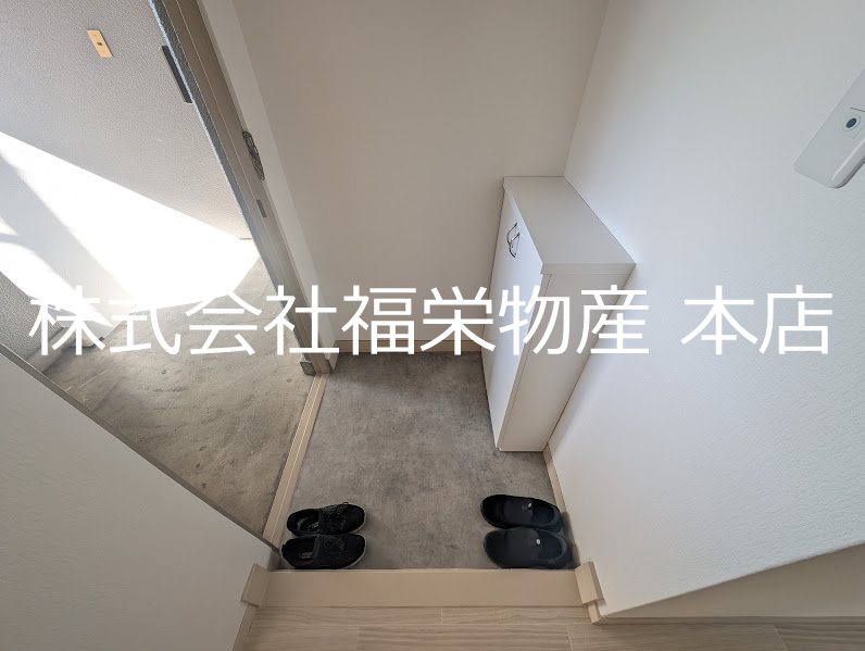 明和マンション 玄関