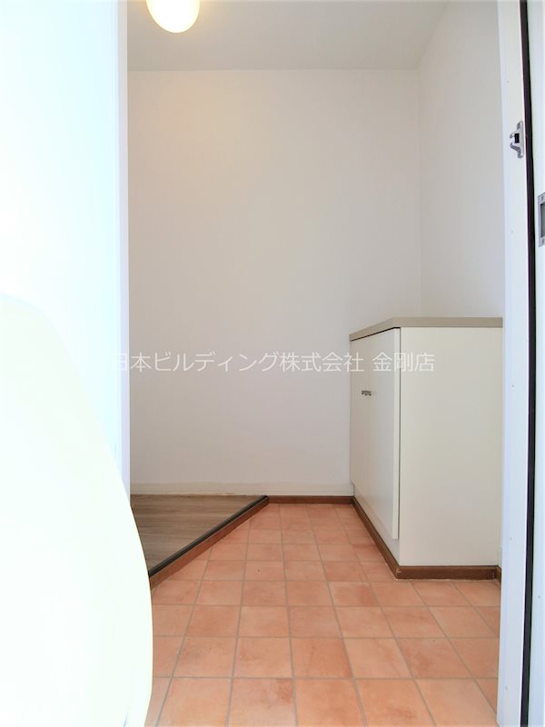 プレステージ大美野 玄関