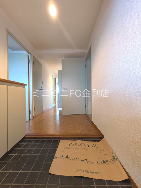 コスモ北野田 玄関