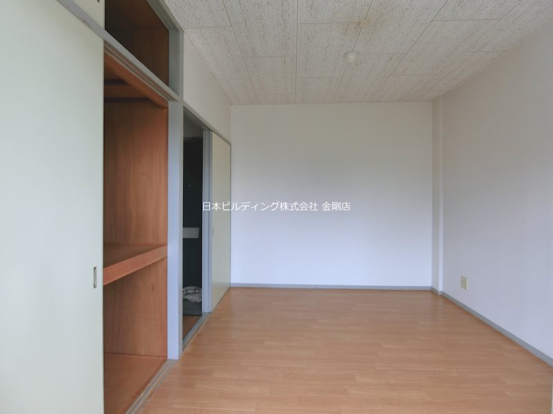 楠古谷マンション ベッドルーム