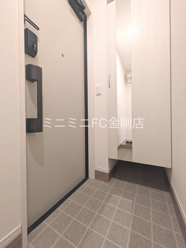 シャルマン東三国ヶ丘 玄関