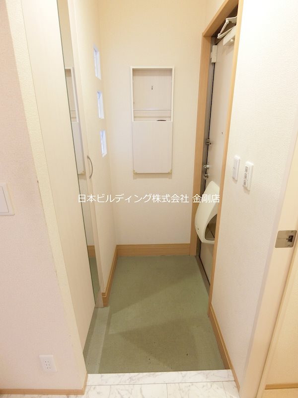 ファミールタカゼンＷ棟 玄関