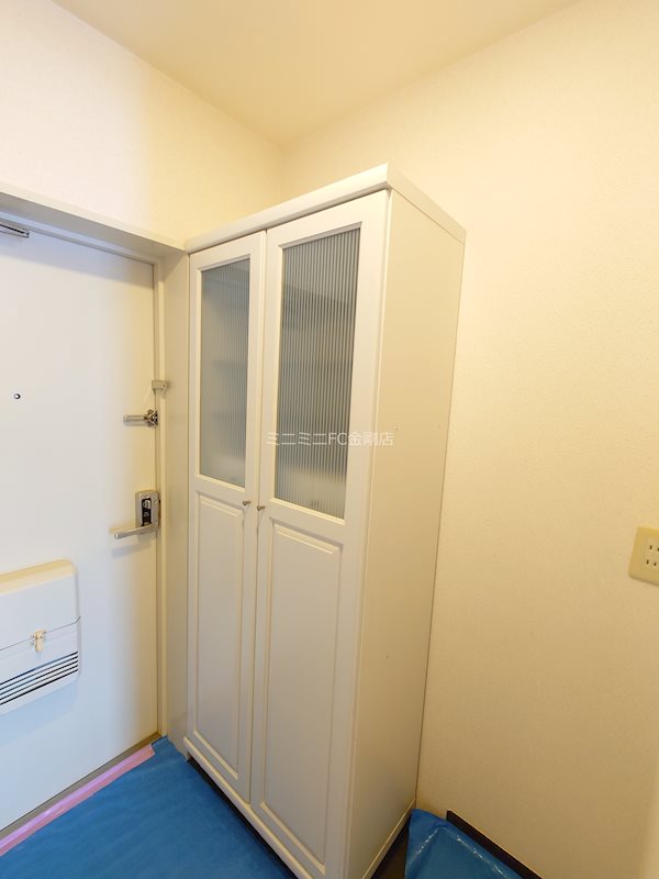 メゾンドール富田林 玄関