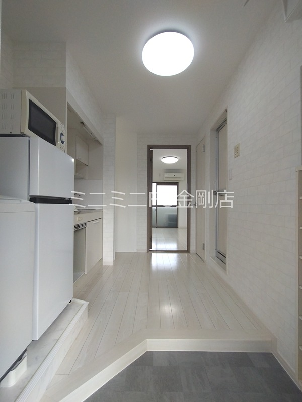 アミューズＳＵＧＡ 玄関