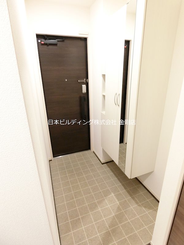 メゾンドール北野田 玄関