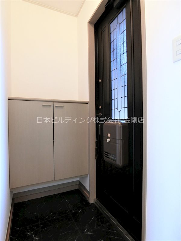 メイプルガーデン大美野 玄関