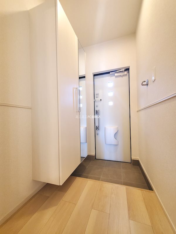 プログレス　コート 玄関