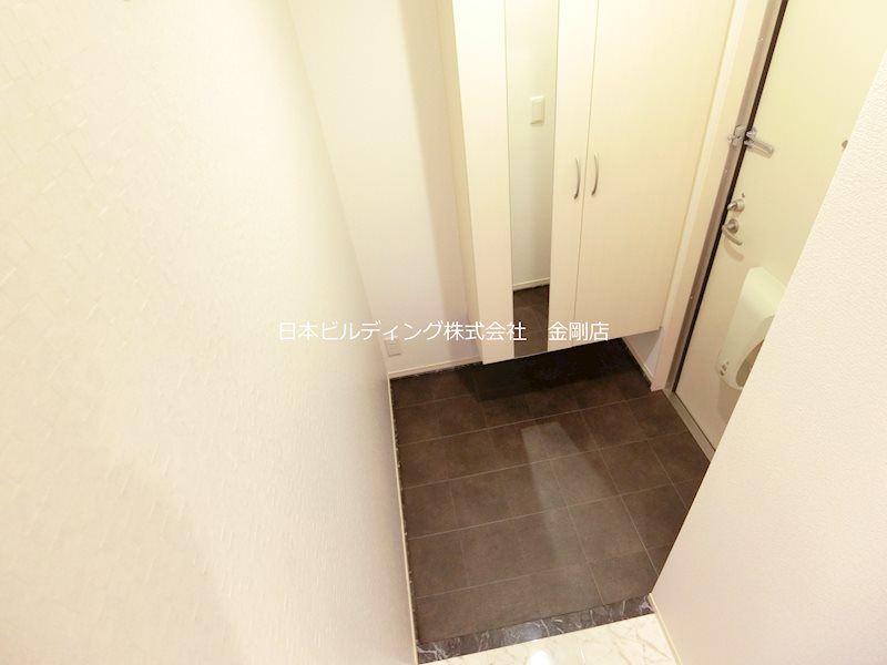 セジュール寺池台 玄関