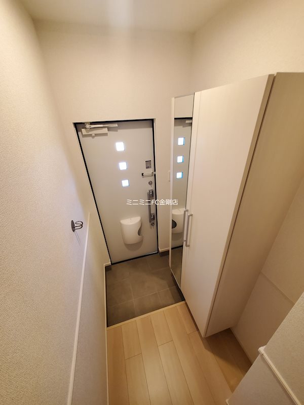 プログレス　コート 玄関