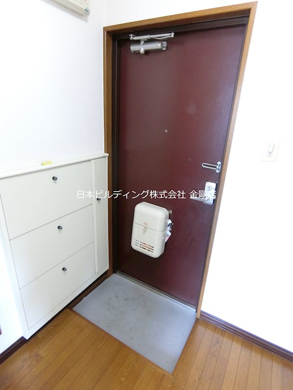 ハイツスミトク 玄関