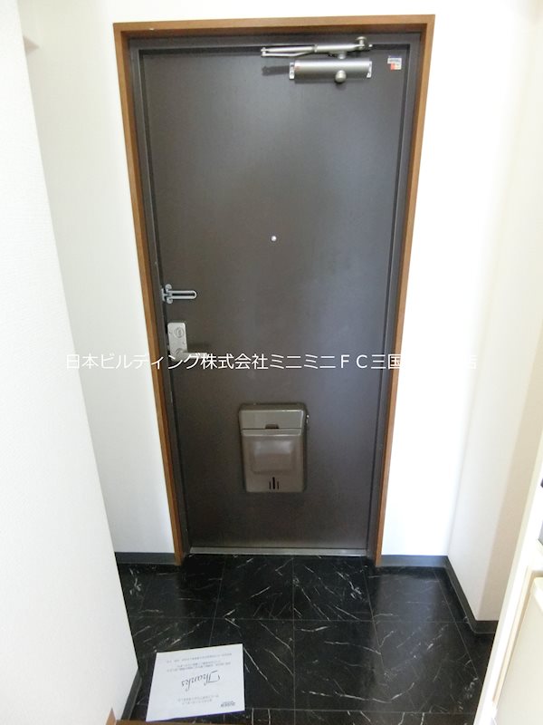 コスモビクトリー 玄関