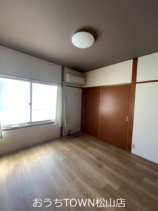 石田店舗付き住宅 ベッドルーム